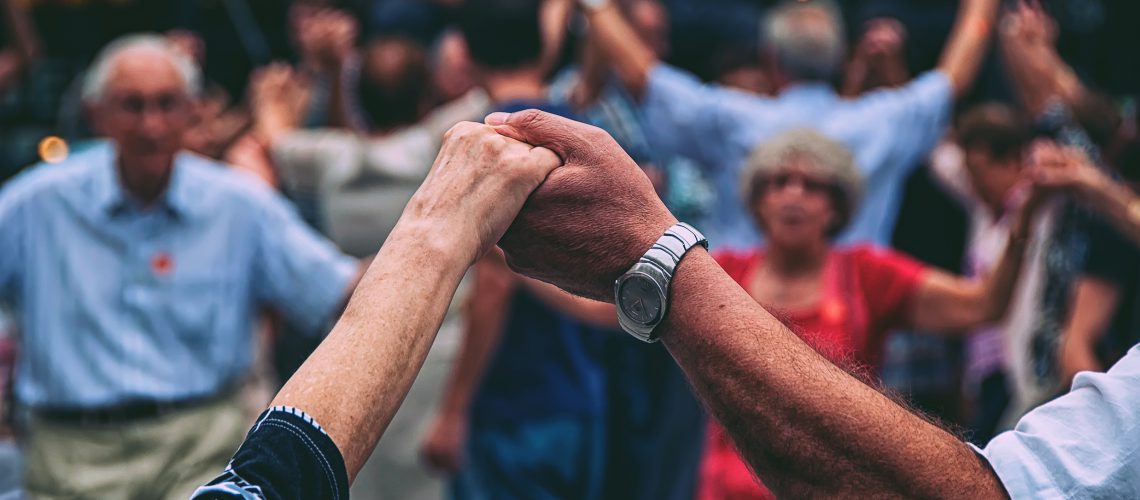 View,Of,Senior,People,Holding,Hands,And,Dancing,National,Dance