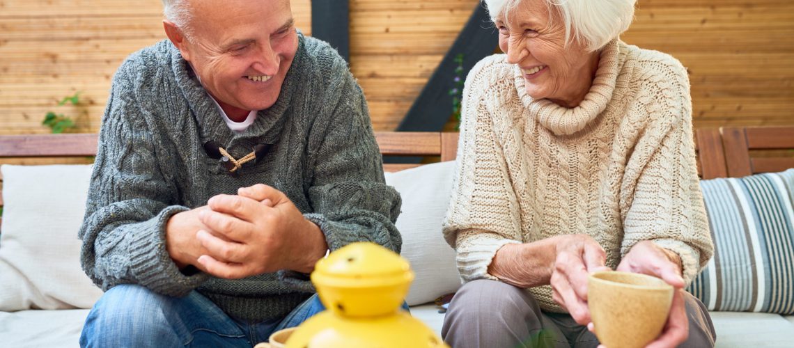 Portrait,Of,Happy,Senior,Couple,Laughing,Heartily,Enjoying,Time,Together